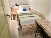 18 room capsule hotel